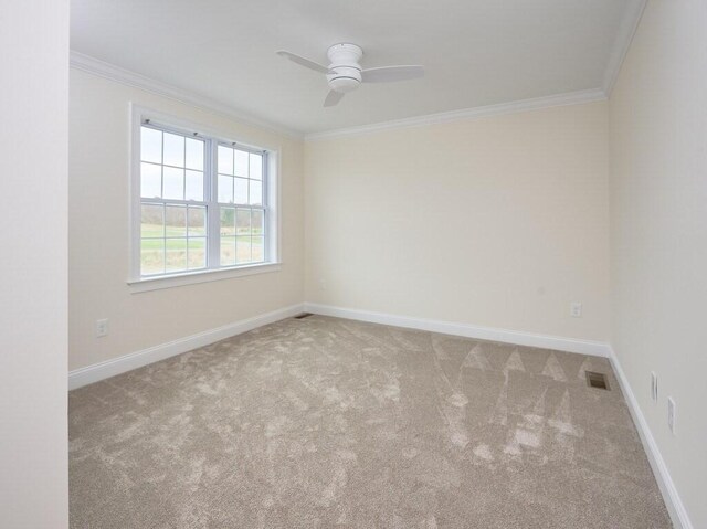 70 Kilburn St, Lunenburg, MA 01462 - carpeted spare room featuring ornamental molding, ceiling fan, and baseboards