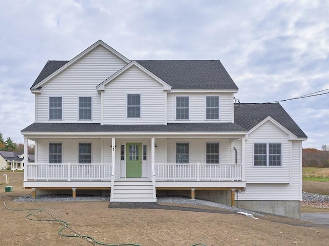 70 Kilburn St, Lunenburg, MA 01462 - view of front facade featuring covered porch and a shingled roof