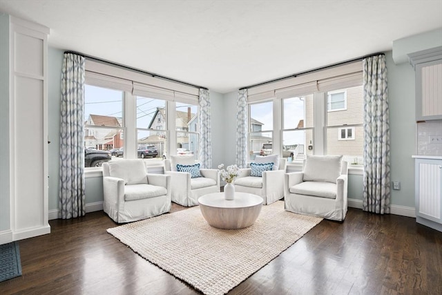 77 Lighthouse Rd, Scituate, MA 02066 - living area with dark wood-style flooring and baseboards