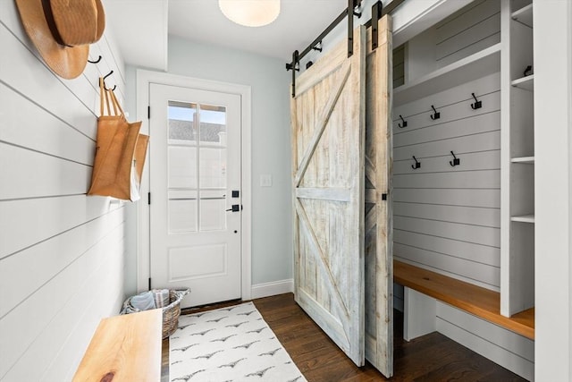 77 Lighthouse Rd, Scituate, MA 02066 - mudroom with a barn door, dark wood finished floors, and baseboards