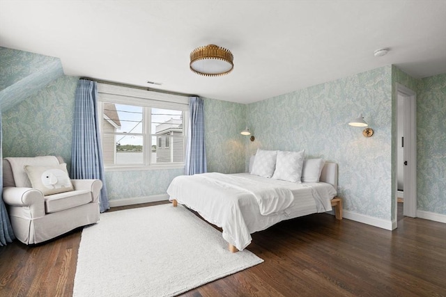 77 Lighthouse Rd, Scituate, MA 02066 - bedroom with wallpapered walls, wood finished floors, and baseboards