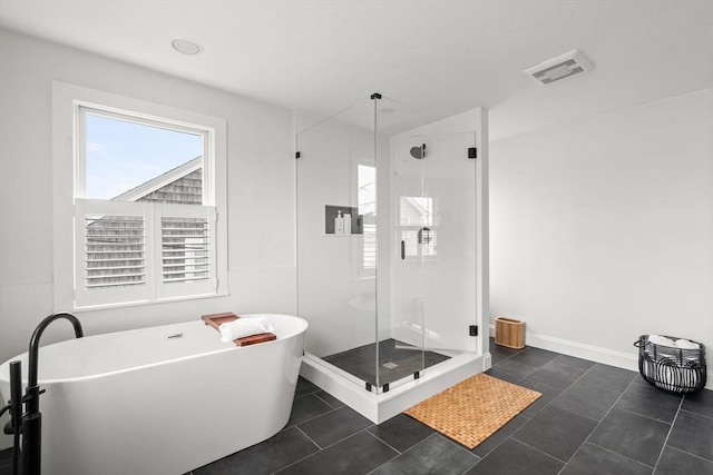 77 Lighthouse Rd, Scituate, MA 02066 - bathroom featuring a soaking tub, a stall shower, tile patterned floors, and baseboards