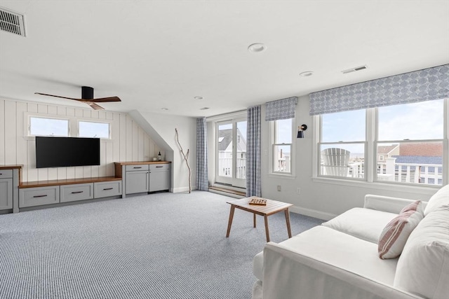 77 Lighthouse Rd, Scituate, MA 02066 - living area with baseboards, carpet floors, and ceiling fan