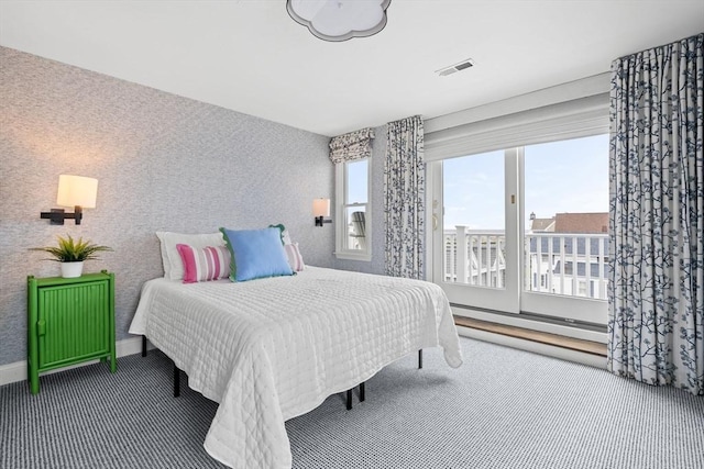 77 Lighthouse Rd, Scituate, MA 02066 - carpeted bedroom with access to outside and baseboards