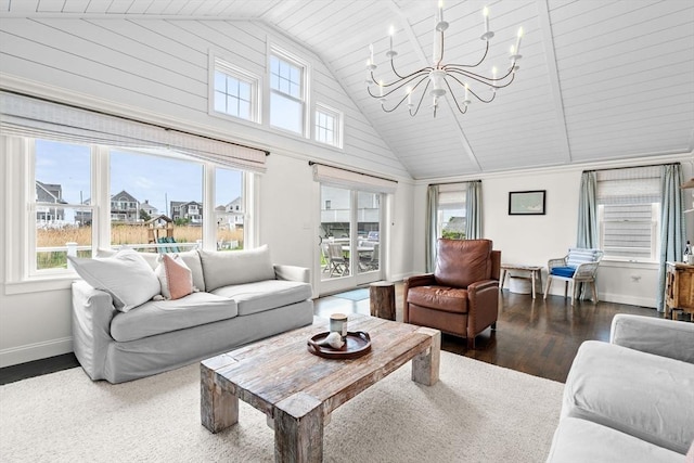 77 Lighthouse Rd, Scituate, MA 02066 - living area with high vaulted ceiling, a chandelier, wood finished floors, and baseboards