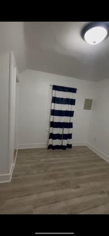 hallway featuring dark wood-type flooring