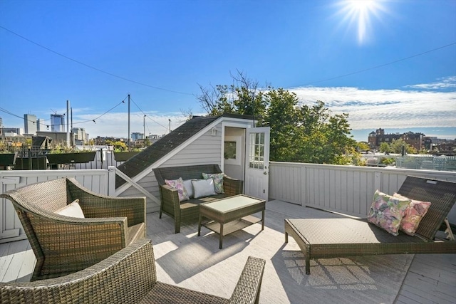 view of patio / terrace featuring an outdoor hangout area and an outdoor structure