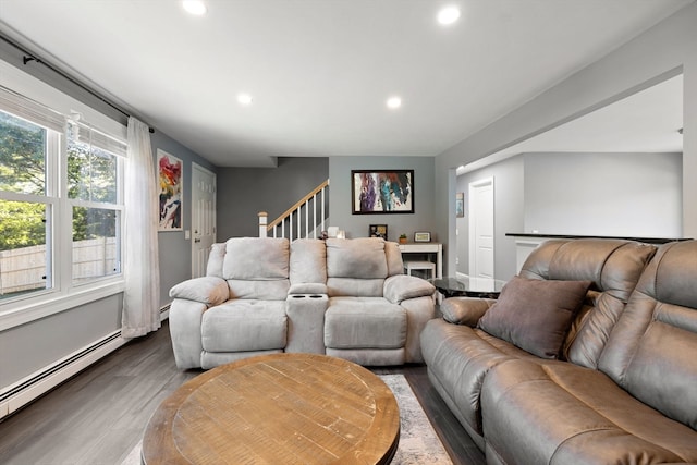 living room featuring hardwood / wood-style flooring and a baseboard radiator