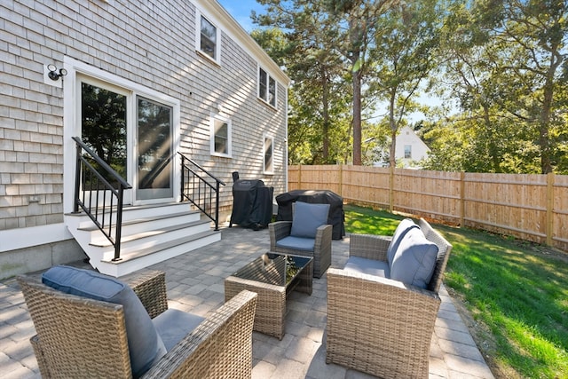 view of patio / terrace featuring area for grilling and outdoor lounge area