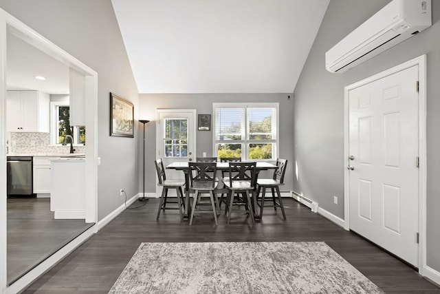 dining room featuring vaulted ceiling, dark wood-type flooring, and a wall mounted air conditioner