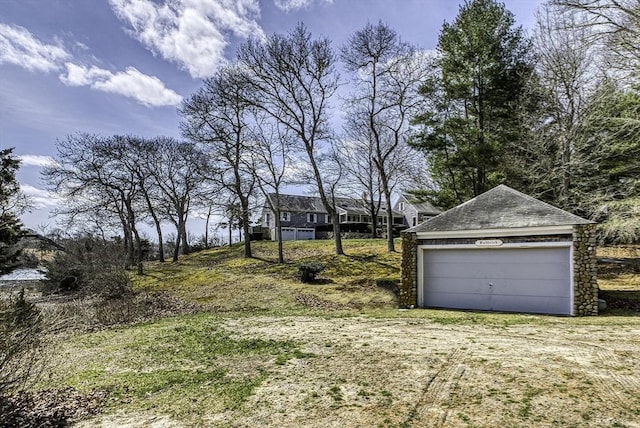 31 Baxendale Rd, Bourne, MA 02532 - view of yard with a garage and an outdoor structure