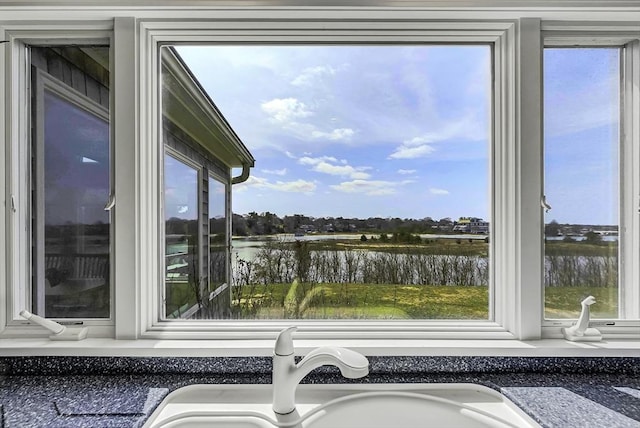 31 Baxendale Rd, Bourne, MA 02532 - room details with a sink and a water view