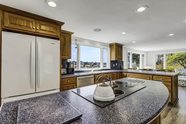 31 Baxendale Rd, Bourne, MA 02532 - kitchen featuring freestanding refrigerator, a peninsula, dishwasher, dark countertops, and black electric stovetop
