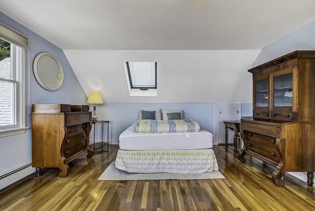 31 Baxendale Rd, Bourne, MA 02532 - bedroom with a baseboard radiator, wood finished floors, and vaulted ceiling