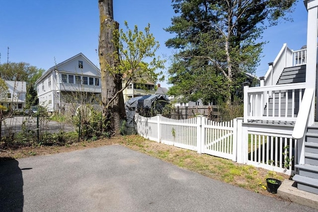 view of home's exterior featuring fence private yard
