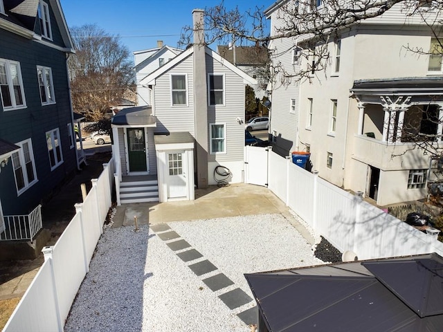 exterior space with fence and a patio