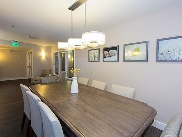 dining room with dark wood-type flooring