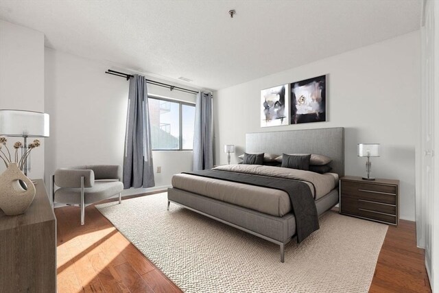 bedroom featuring wood-type flooring