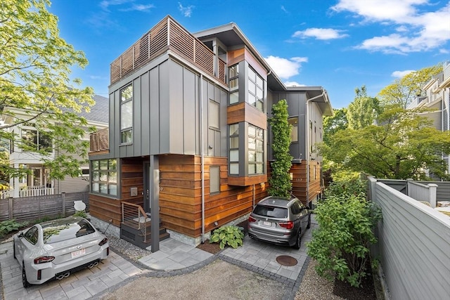 137 Walden St Unit 137, Cambridge, MA 02140 - view of front of property featuring board and batten siding