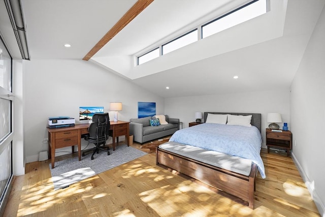137 Walden St Unit 137, Cambridge, MA 02140 - bedroom featuring vaulted ceiling, wood finished floors, and an office area