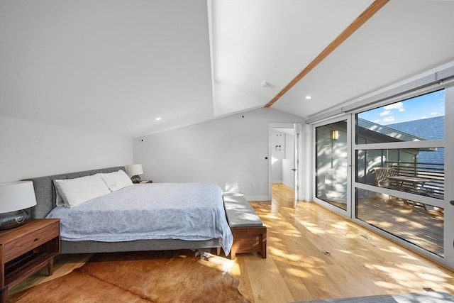 137 Walden St Unit 137, Cambridge, MA 02140 - bedroom with lofted ceiling, light wood-style floors, and baseboards