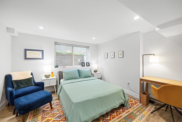 137 Walden St Unit 137, Cambridge, MA 02140 - bedroom featuring wood finished floors, baseboards, and recessed lighting