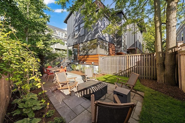 137 Walden St Unit 137, Cambridge, MA 02140 - fenced backyard featuring a patio