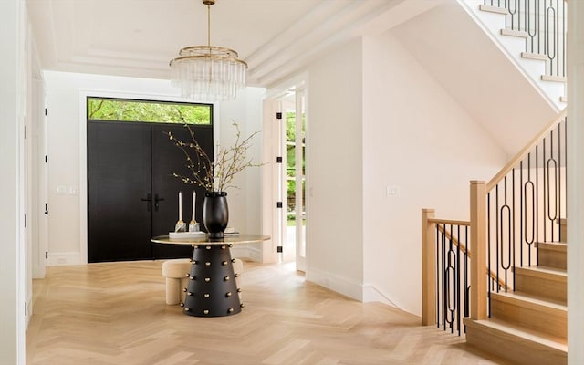 95 Blake St, Newton, MA 02460 - entrance foyer with a chandelier, stairway, and baseboards