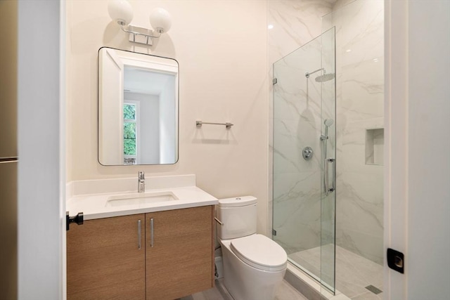 95 Blake St, Newton, MA 02460 - bathroom with a marble finish shower, toilet, and vanity