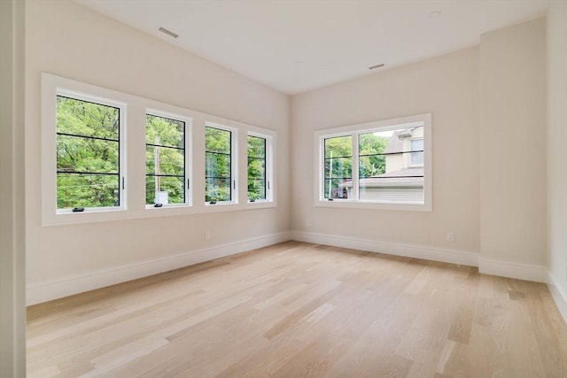 95 Blake St, Newton, MA 02460 - empty room featuring light wood-style floors and baseboards