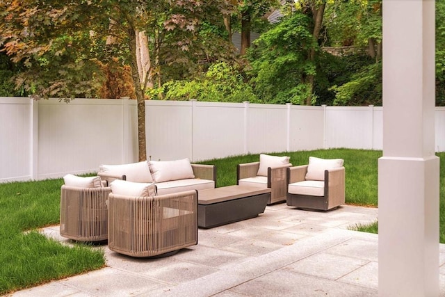 95 Blake St, Newton, MA 02460 - fenced backyard with an outdoor hangout area and a patio