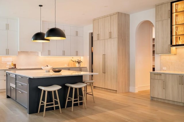 95 Blake St, Newton, MA 02460 - kitchen featuring modern cabinets and arched walkways