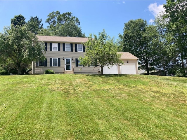 337 Mason Rd, Dudley, MA 01571 - colonial home featuring a garage and a front lawn