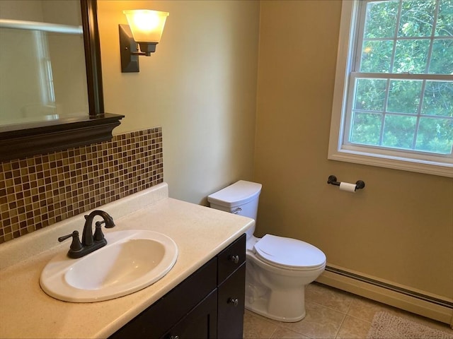 337 Mason Rd, Dudley, MA 01571 - bathroom with a baseboard radiator, backsplash, tile patterned flooring, vanity, and an enclosed shower