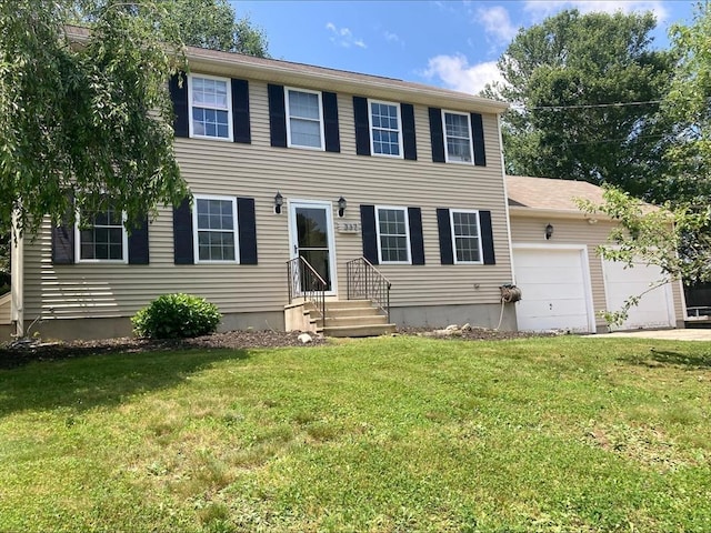 337 Mason Rd, Dudley, MA 01571 - colonial-style house with a garage and a front yard