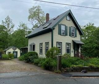 11 Hickory St, Gloucester, MA 01930 - view of side of home with a chimney