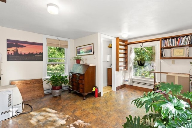 11 Hickory St, Gloucester, MA 01930 - sitting room with a baseboard radiator and baseboards