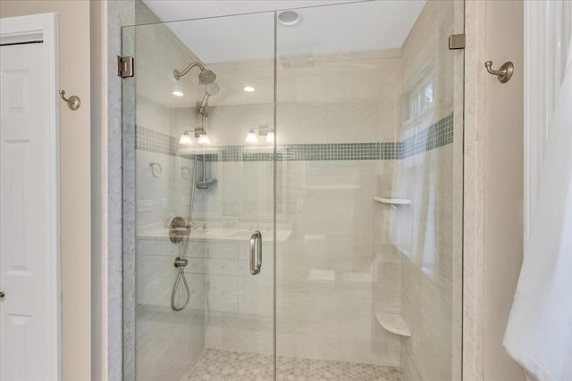 full bathroom featuring a shower stall