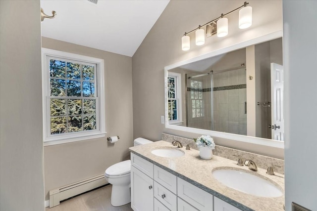 full bath with a baseboard heating unit, vaulted ceiling, a stall shower, and a sink