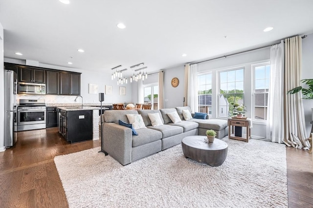 19 Locust Ln Unit 19, Hopkinton, MA 01748 - living area featuring recessed lighting, a chandelier, and dark wood-style floors