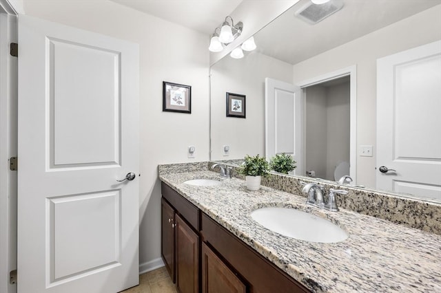 19 Locust Ln Unit 19, Hopkinton, MA 01748 - full bath with double vanity, toilet, baseboards, and tile patterned floors