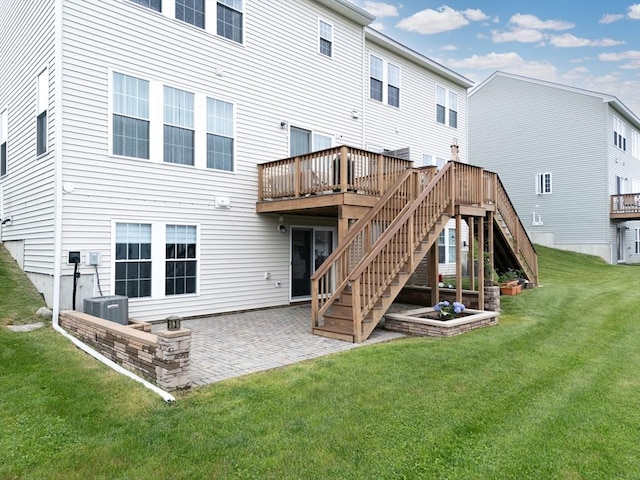 19 Locust Ln Unit 19, Hopkinton, MA 01748 - back of house featuring stairs, a lawn, a deck, and a patio area