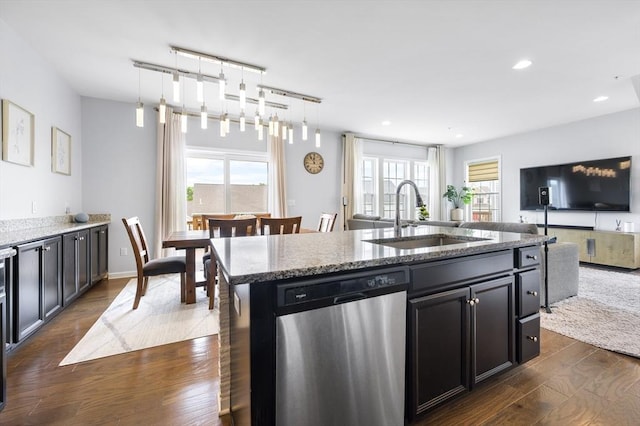 19 Locust Ln Unit 19, Hopkinton, MA 01748 - kitchen featuring stainless steel dishwasher, a sink, dark wood-style flooring, open floor plan, and stone counters