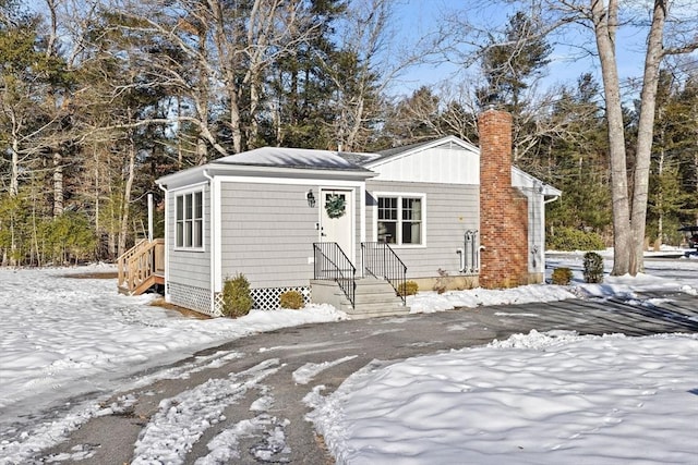 exterior space featuring a chimney