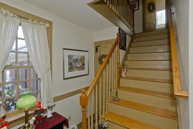 staircase with a healthy amount of sunlight