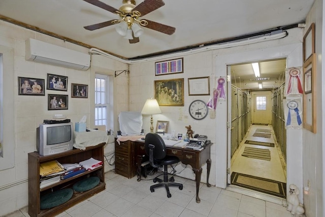 tiled office with a wall unit AC and ceiling fan