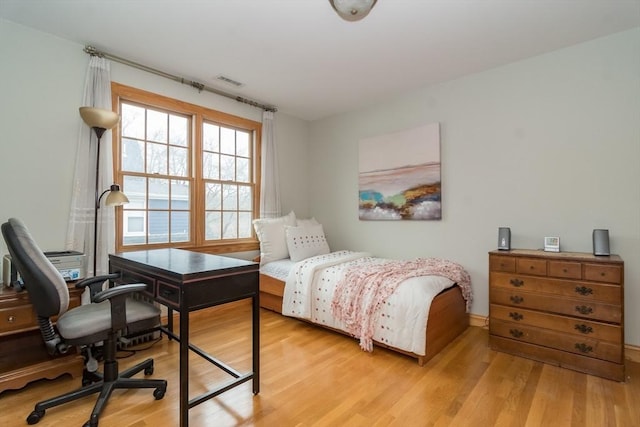 bedroom featuring light hardwood / wood-style floors