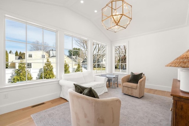 32 S Woodside Ave, Wellesley, MA 02482 - sunroom with a chandelier and vaulted ceiling