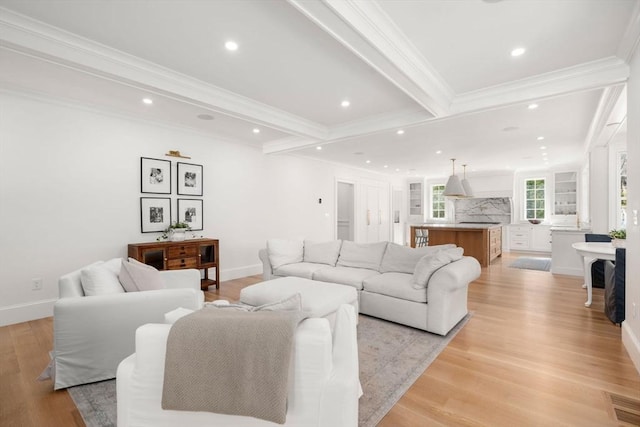 32 S Woodside Ave, Wellesley, MA 02482 - living area featuring recessed lighting, crown molding, light wood-type flooring, beam ceiling, and baseboards