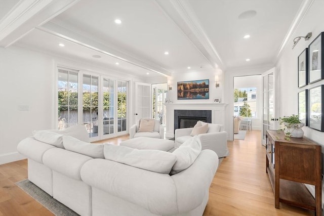 32 S Woodside Ave, Wellesley, MA 02482 - living room with ornamental molding, beamed ceiling, light wood-type flooring, a glass covered fireplace, and recessed lighting